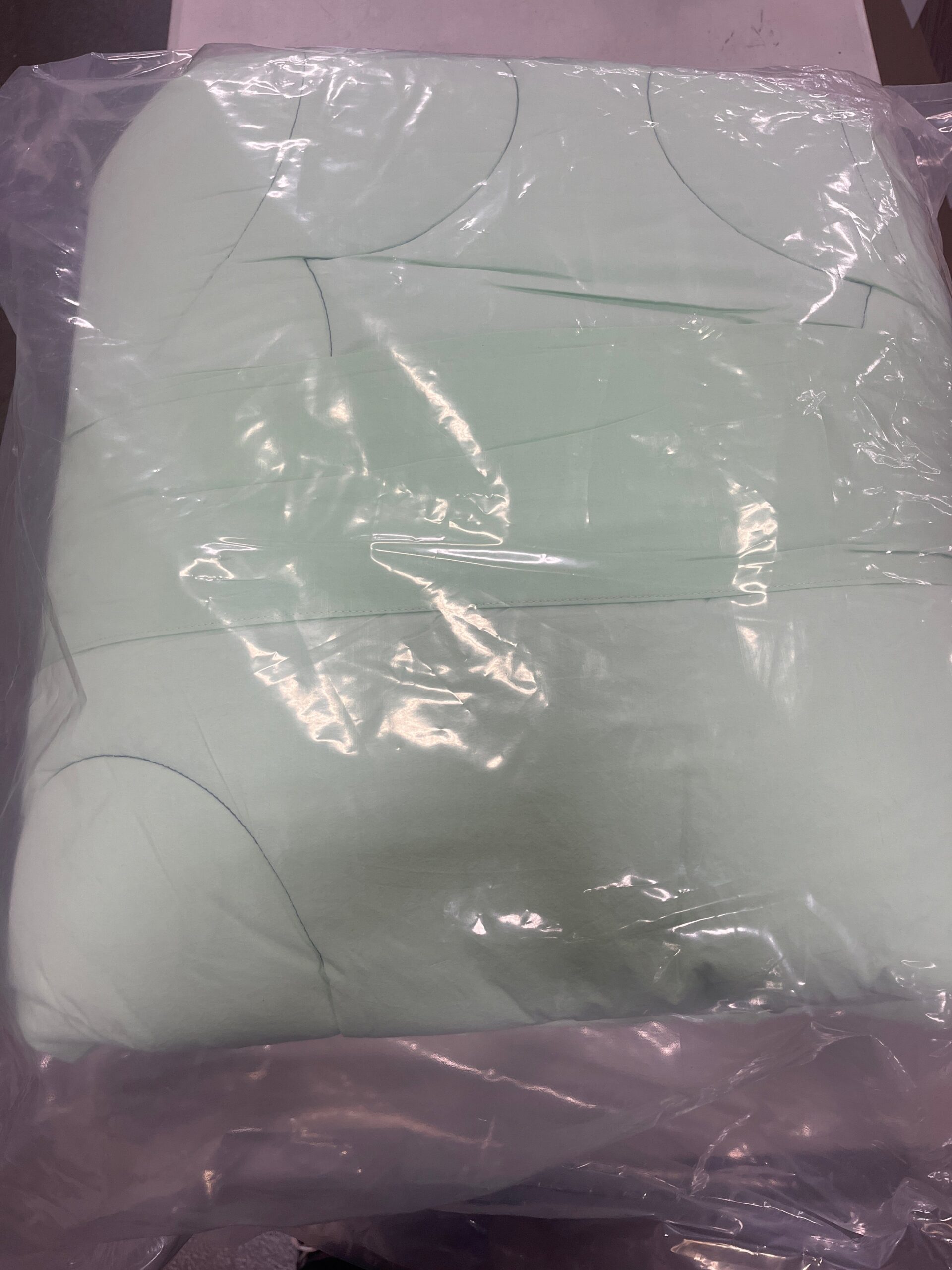Mixed home merchandise wrapped for delivery