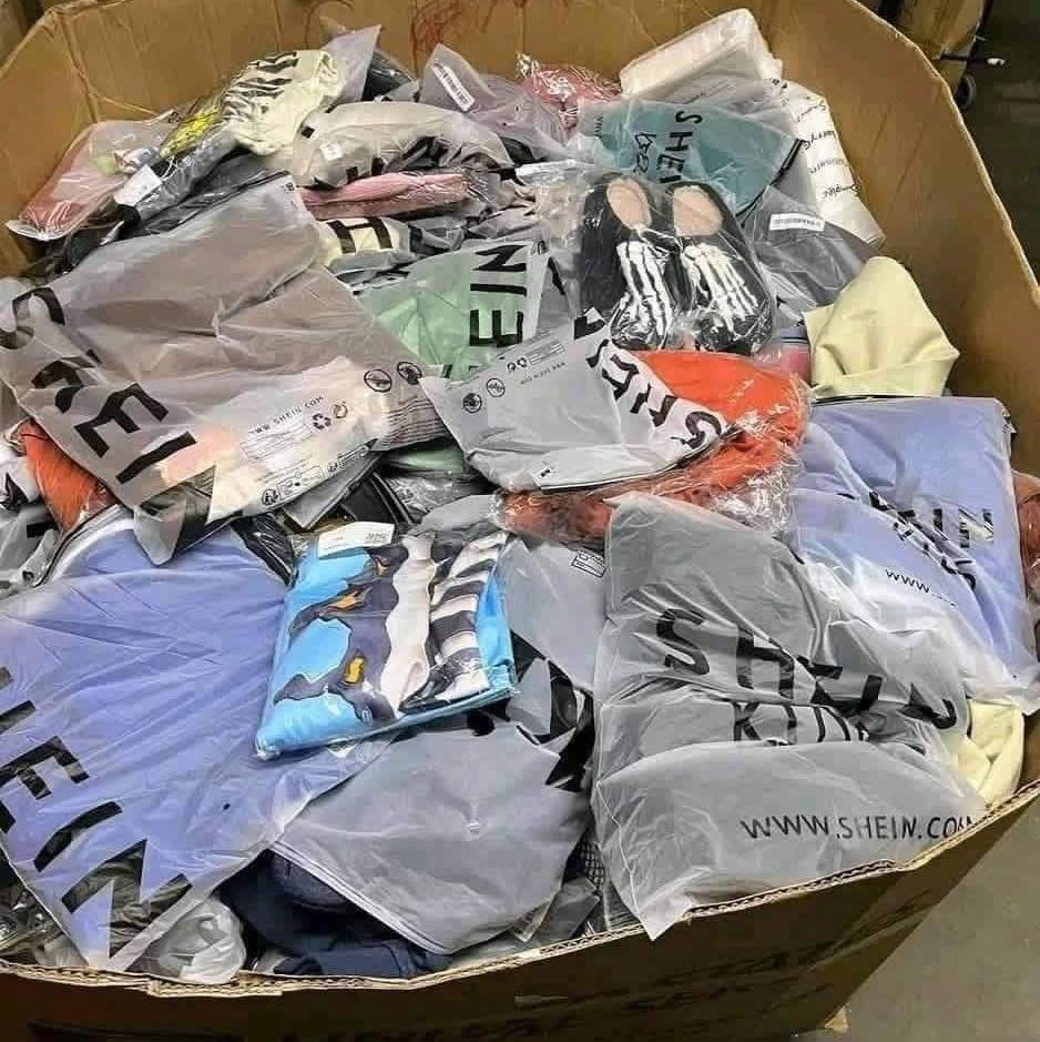 Business owner selecting bulk merchandise for resale