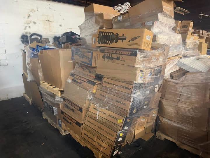 Forklift operator moving wholesale stock