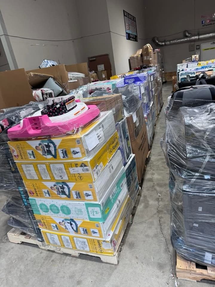 Business owner selecting bulk merchandise for resale