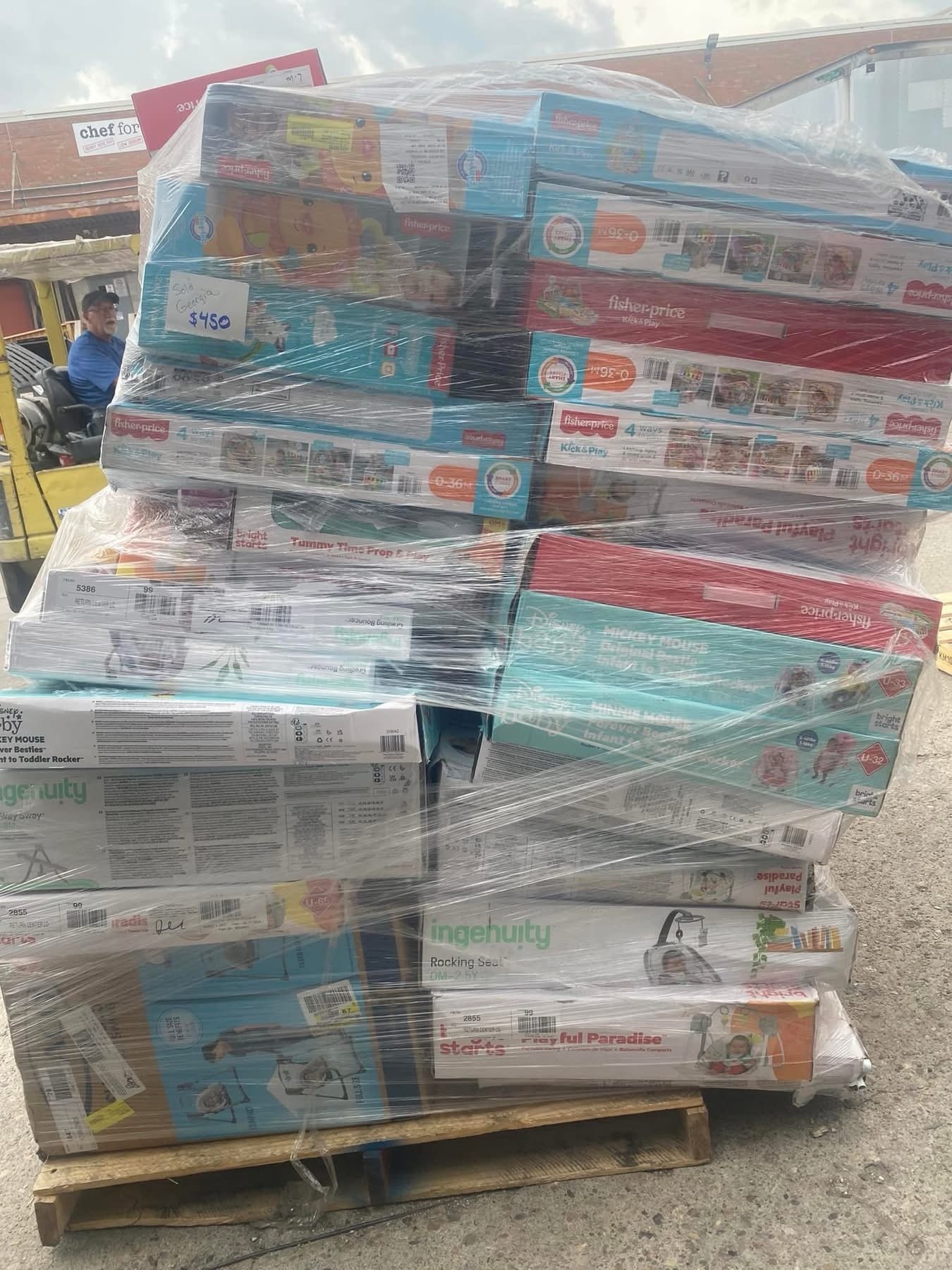 Storage bins and household items on a pallet