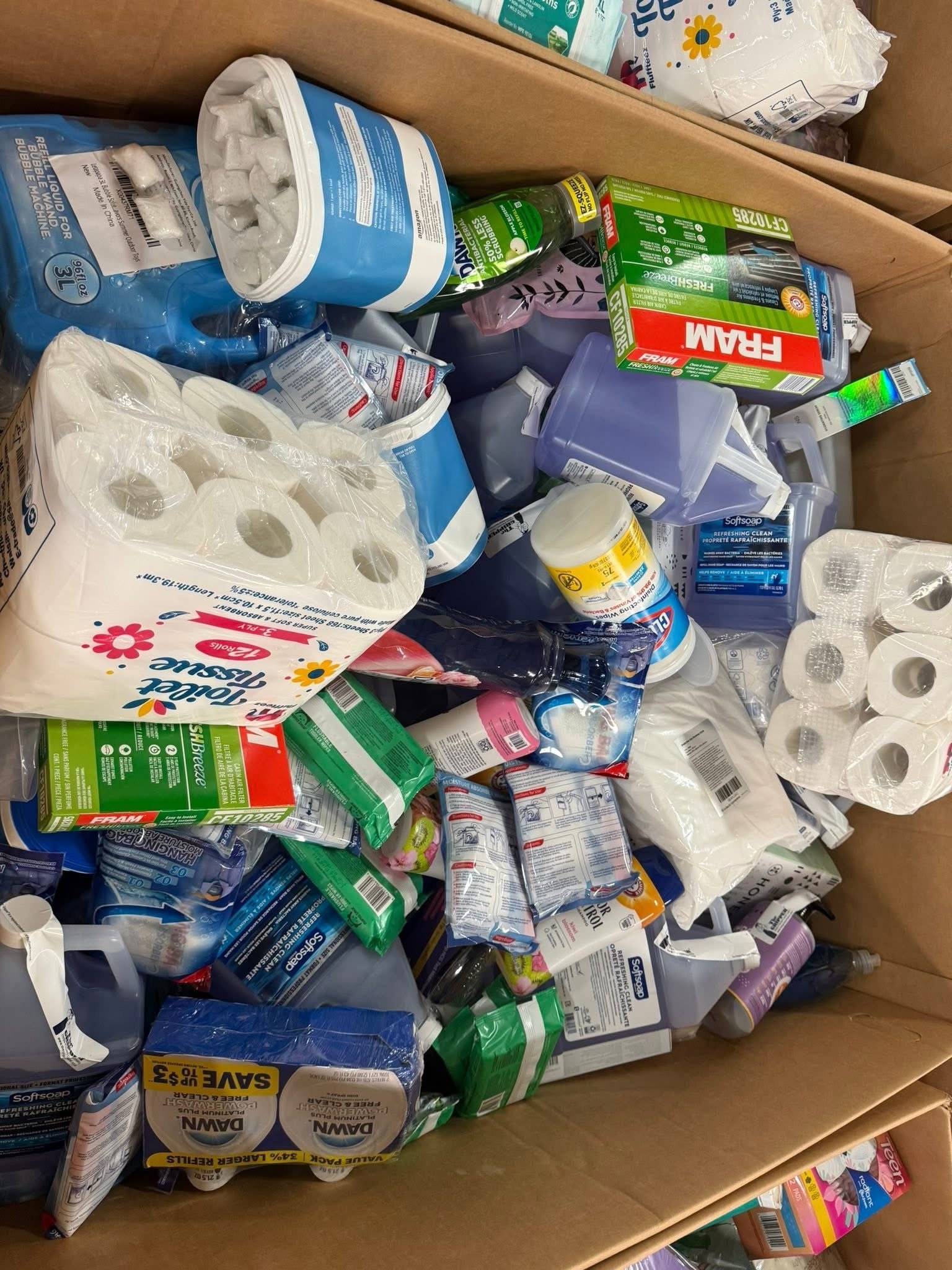 Storage bins and household items on a pallet